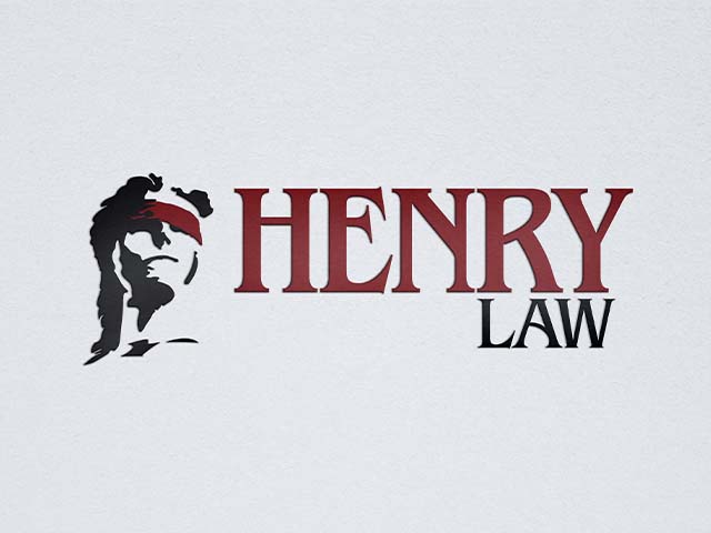 Henry Law logo shows lady justice blind folded next to the company name